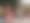 Ein Junge hat Notizzettel im Gesicht auf denen auf Englisch Körperteile stehen.
